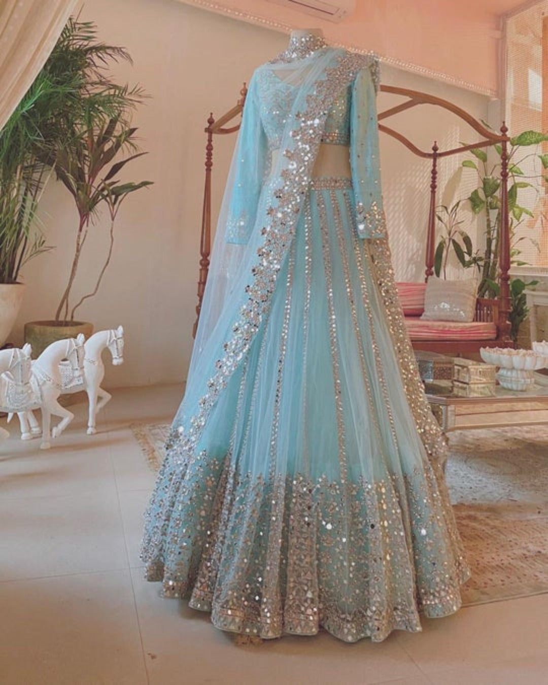 EXQUISITE SKY BLUE COLOR SOFT NET BASE FLARED LEHENGA CHOLI