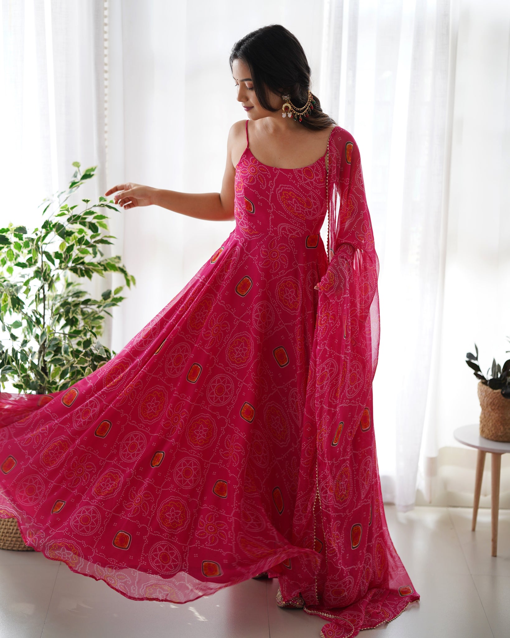 FLAUNT YOUR STYLE WITH OUR READY-TO-WEAR PINK BANDHEJ PRINT CHIFFON GOWN