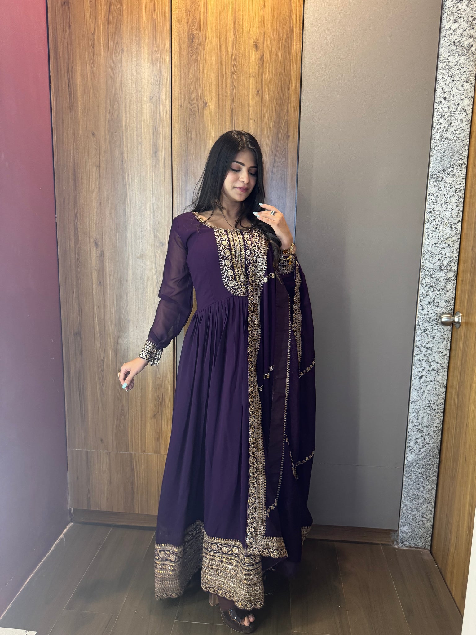 ANCHOR VISHWA PANDYA IN PURPLE COLOR FAUX BLOOMING RICH SEQUENCE EMBROIDERED GOWN