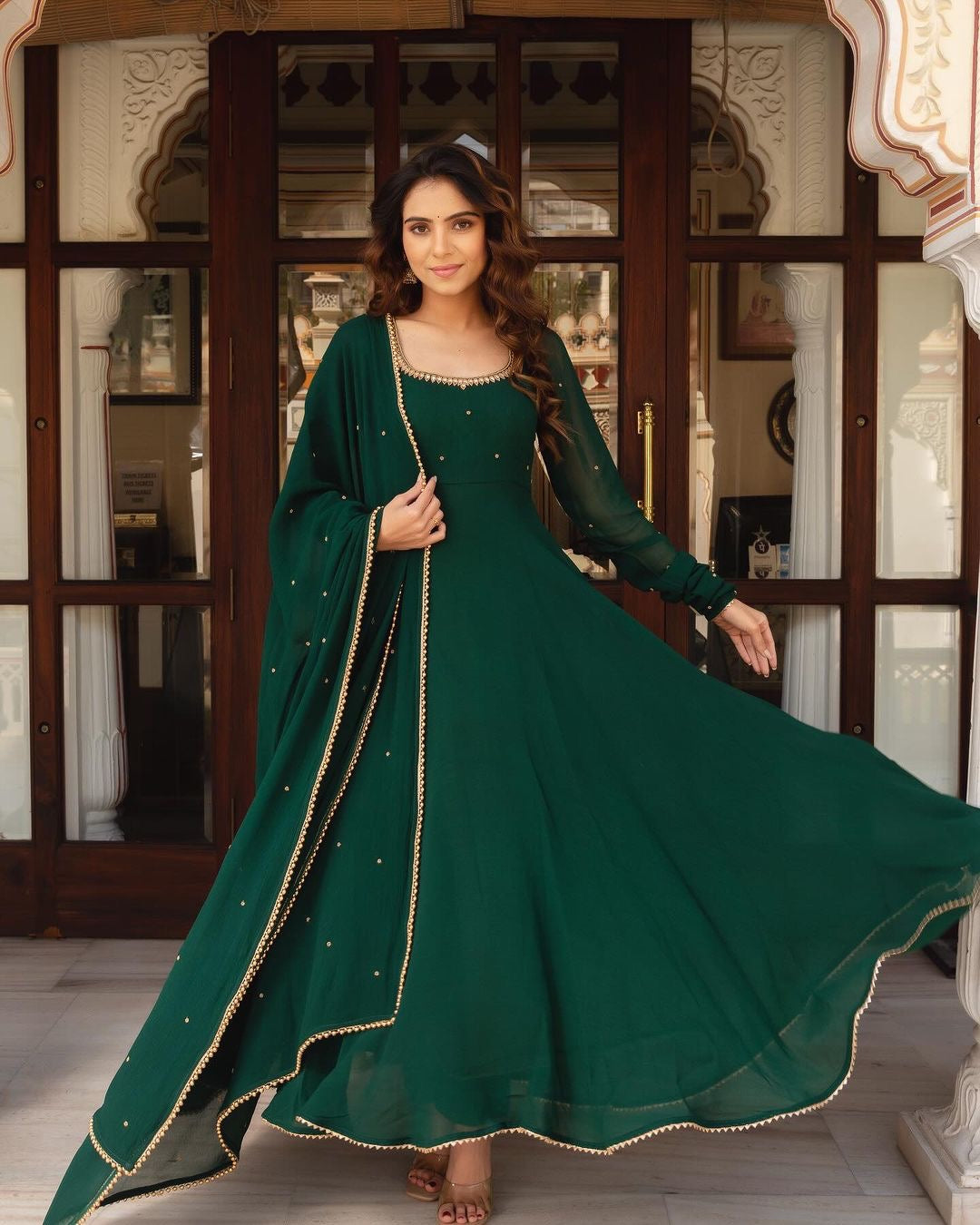 GREEN COLOR SOFT GEORGETTE WITH SEQUENCE FULLY FLAIR ANARKALI SUIT