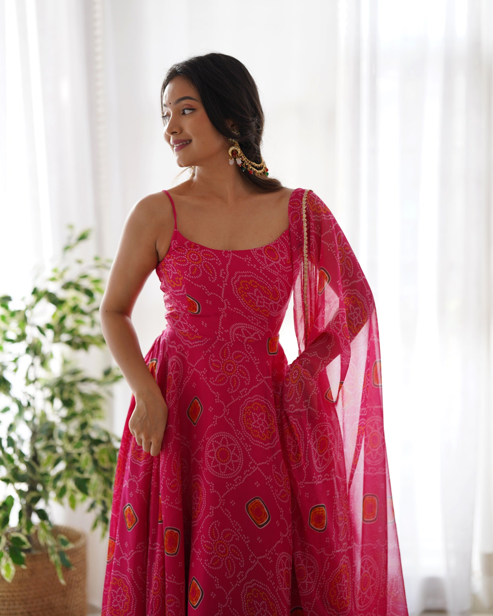 FLAUNT YOUR STYLE WITH OUR READY-TO-WEAR PINK BANDHEJ PRINT CHIFFON GOWN