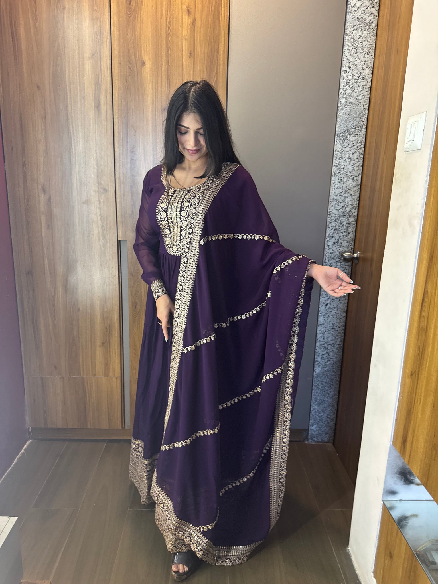 ANCHOR VISHWA PANDYA IN PURPLE COLOR FAUX BLOOMING RICH SEQUENCE EMBROIDERED GOWN