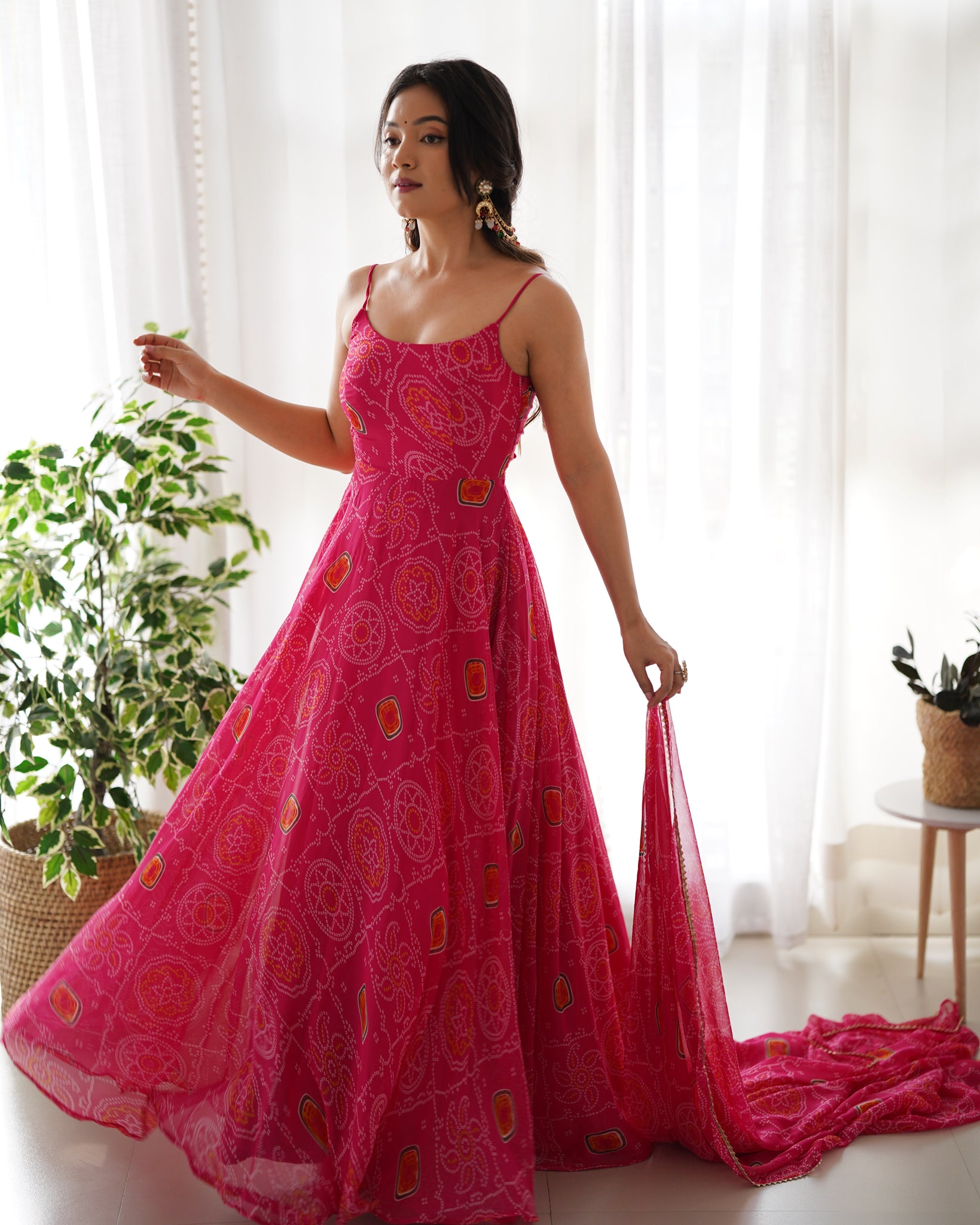 FLAUNT YOUR STYLE WITH OUR READY-TO-WEAR PINK BANDHEJ PRINT CHIFFON GOWN