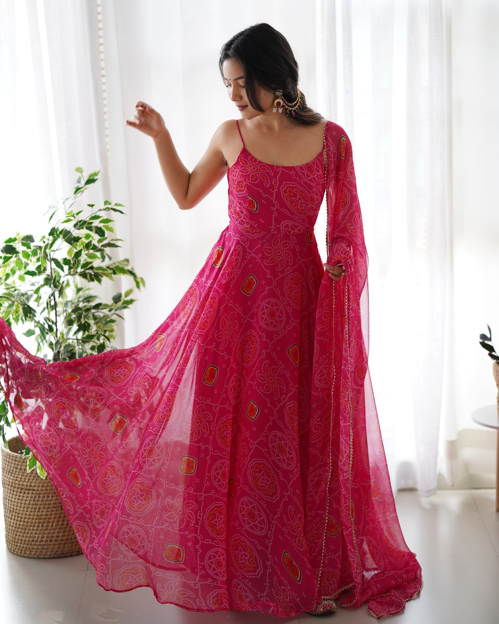 FLAUNT YOUR STYLE WITH OUR READY-TO-WEAR PINK BANDHEJ PRINT CHIFFON GOWN