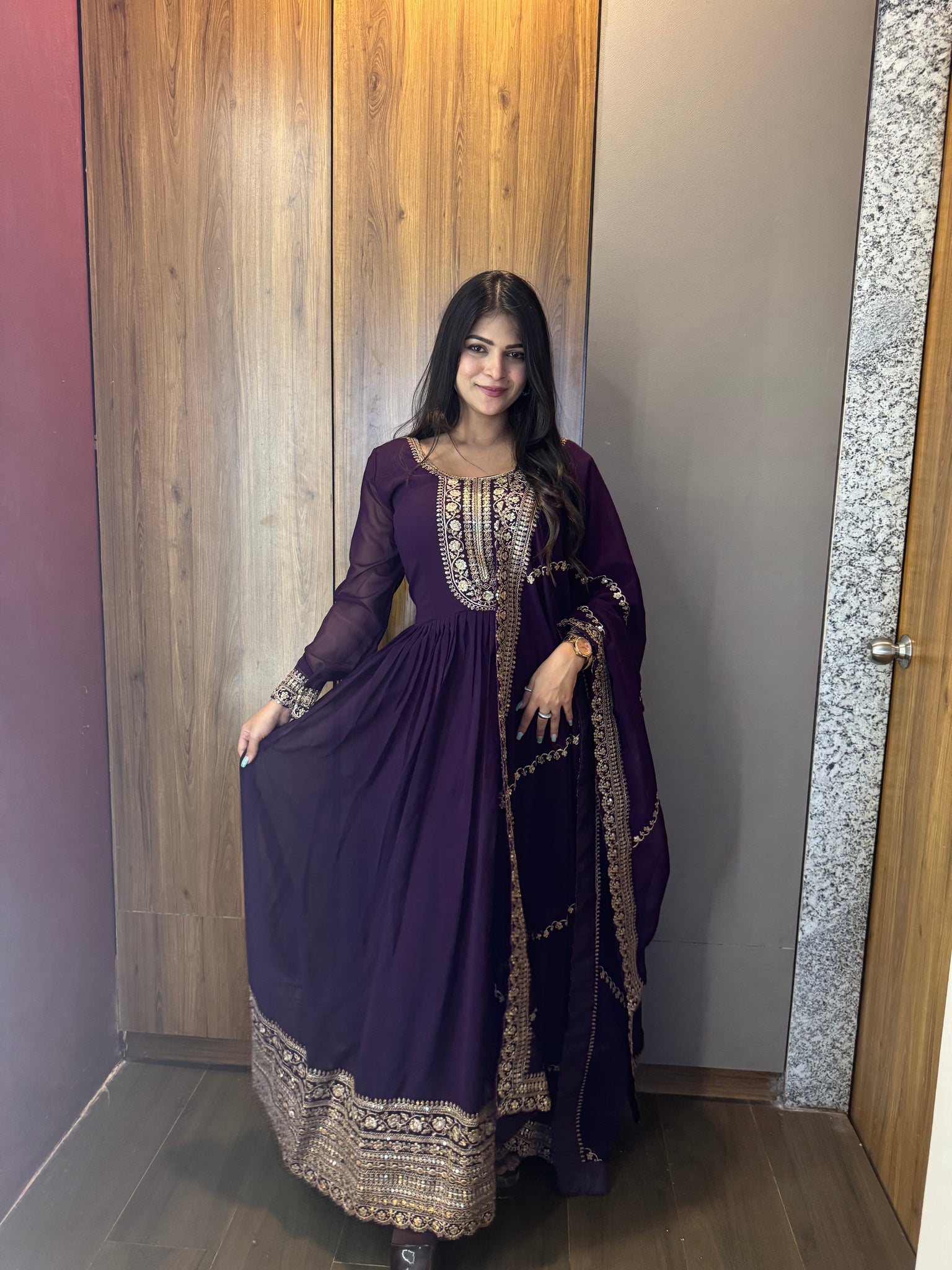 ANCHOR VISHWA PANDYA IN PURPLE COLOR FAUX BLOOMING RICH SEQUENCE EMBROIDERED GOWN