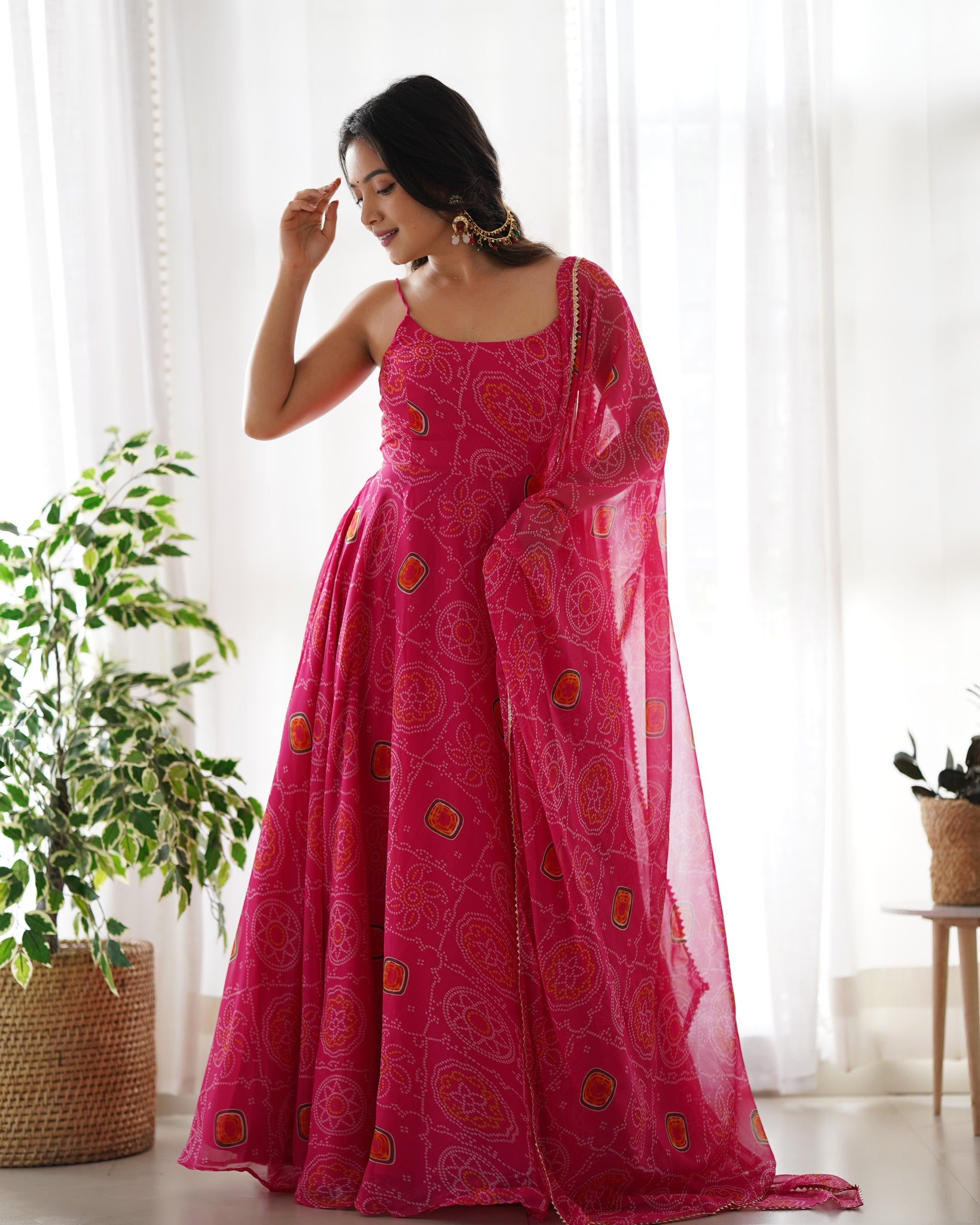 FLAUNT YOUR STYLE WITH OUR READY-TO-WEAR PINK BANDHEJ PRINT CHIFFON GOWN