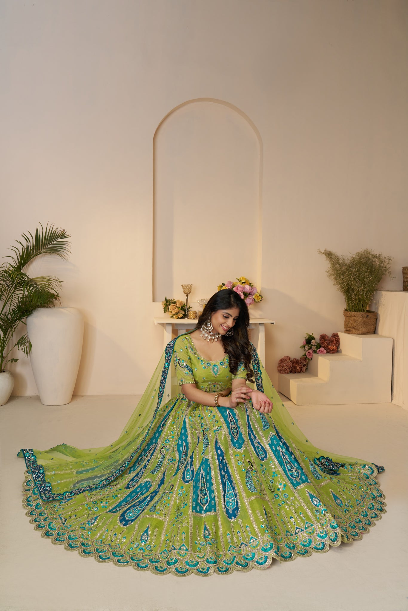 PREMIUM GREEN SOFT NET BRIDAL LEHENGA WITH PAISLEY & PEACOCK EMBROIDERY