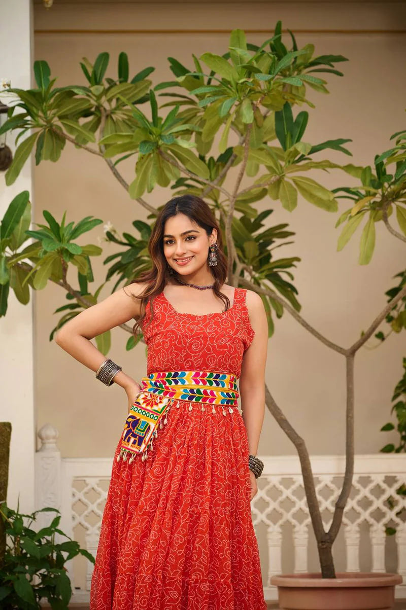 ORANGY RED COLOR NAVRATRI SPECIAL GAMTHI WORK FULLY FLAIR GOWN