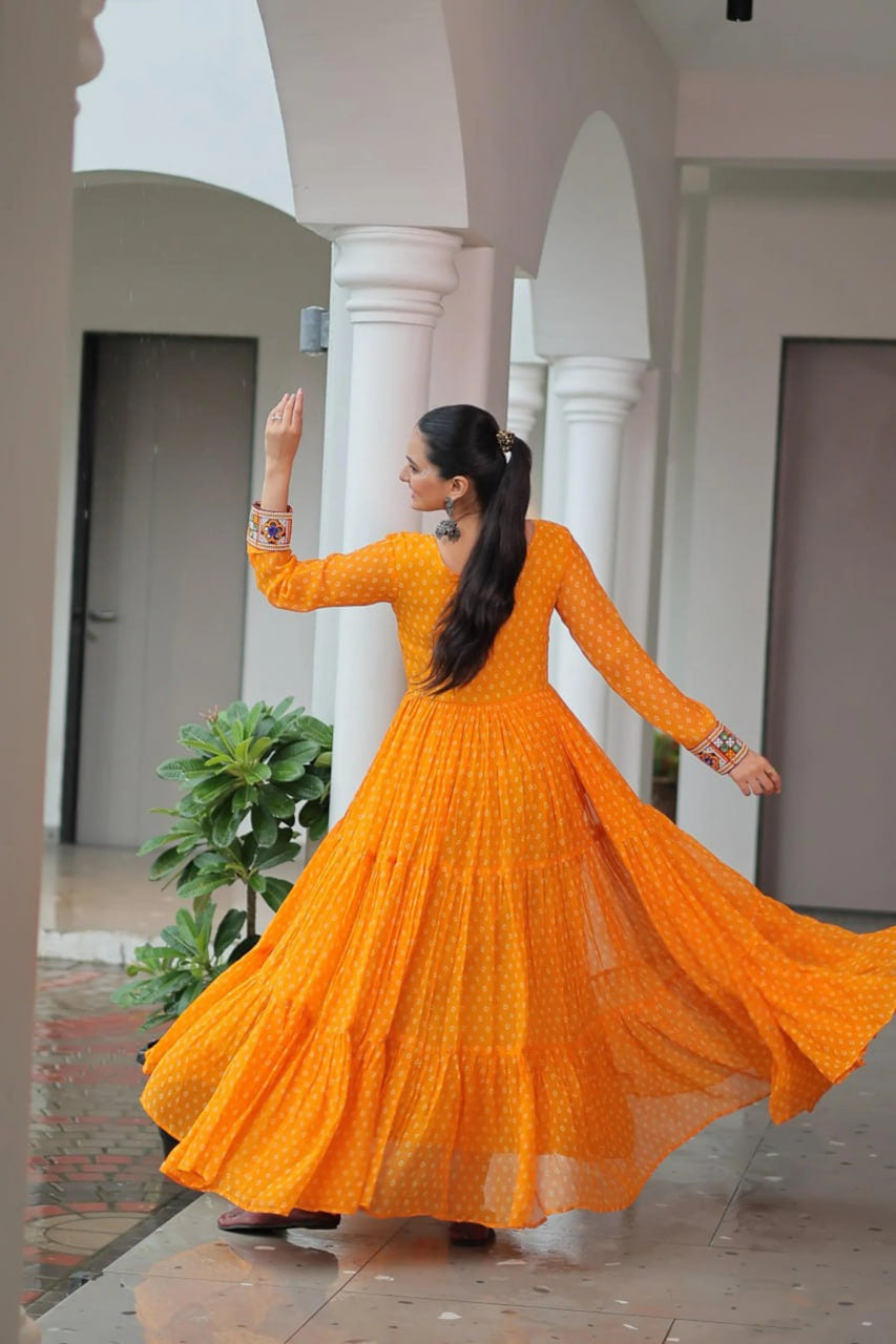 NAVRATRI SPECIAL ORANGE BANDHANI PRINT 12 METER FLARED GOWN