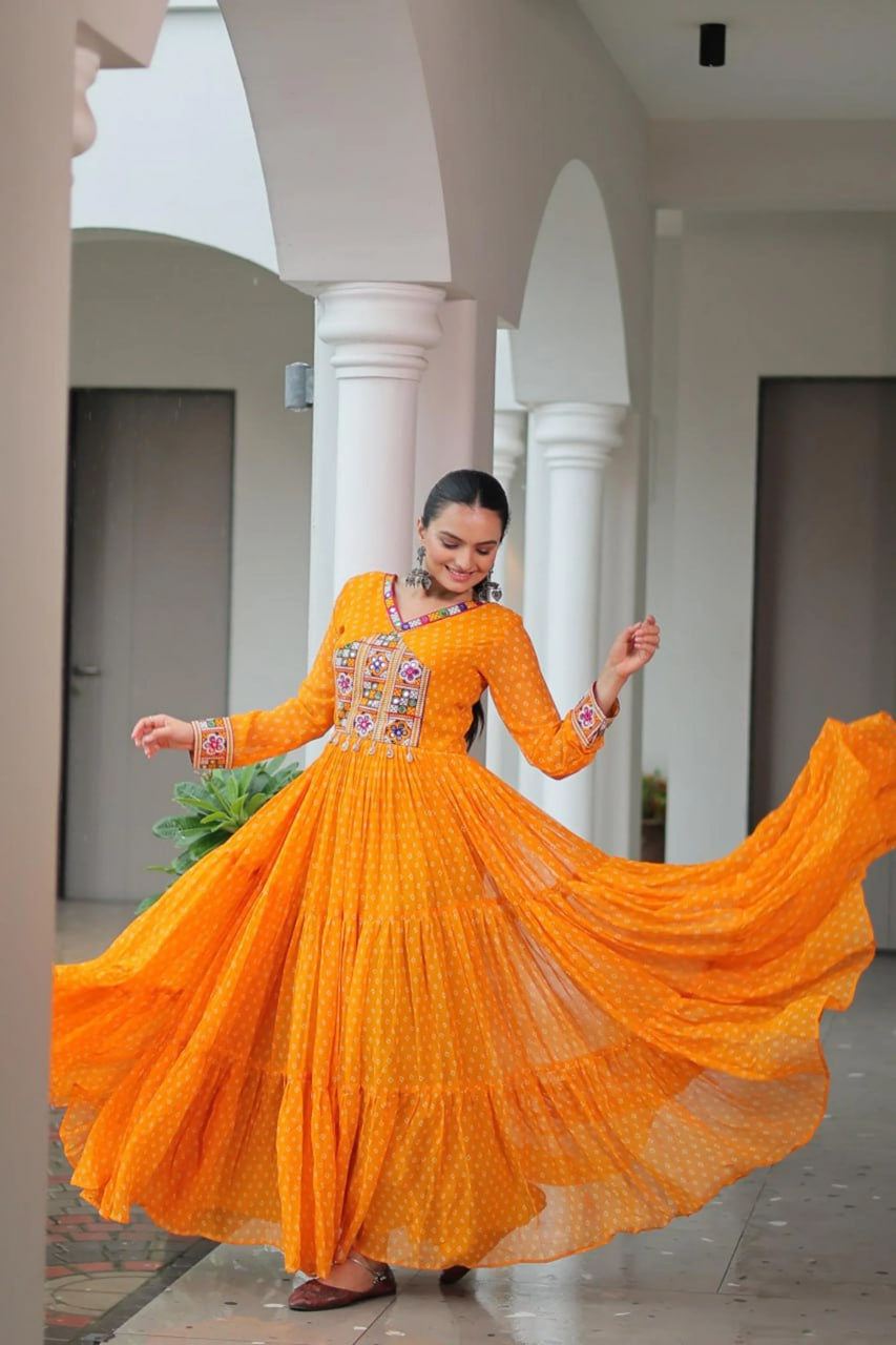 NAVRATRI SPECIAL ORANGE BANDHANI PRINT 12 METER FLARED GOWN